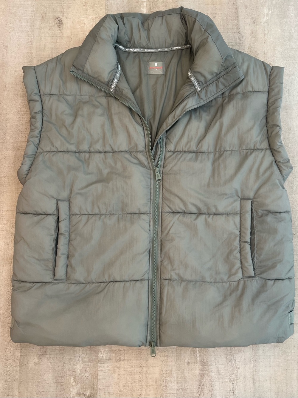 Free People Quilted Sleeveless Puffer Vest in Slate Green